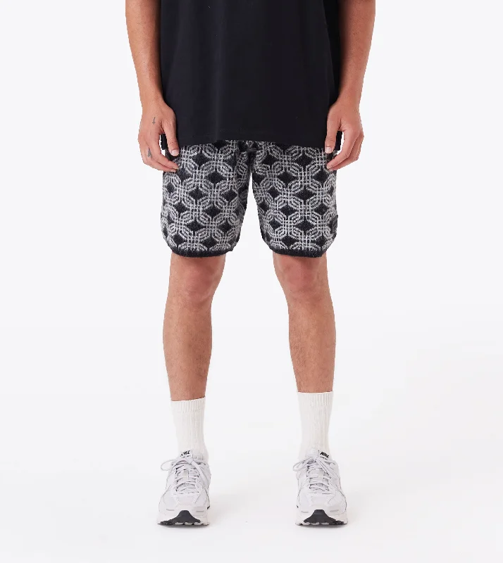 Men's adjustable - length convertible shorts for versatile useLink-Up Jumpa Knit Short Black/Vintage White Men's adjustable - length convertible shorts for versatile useLink-Up Jumpa Knit Short Black/Vintage White