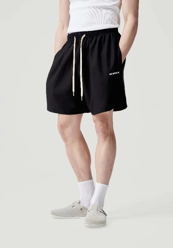Men's side - stripe track shorts for a sporty running lookMKI TENCEL SHORTS