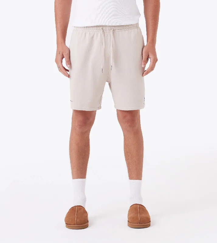 Men's pleated front twill shorts for a classic and sophisticated appearanceTraining Sweat Short Oat Men's pleated front twill shorts for a classic and sophisticated appearanceTraining Sweat Short Oat