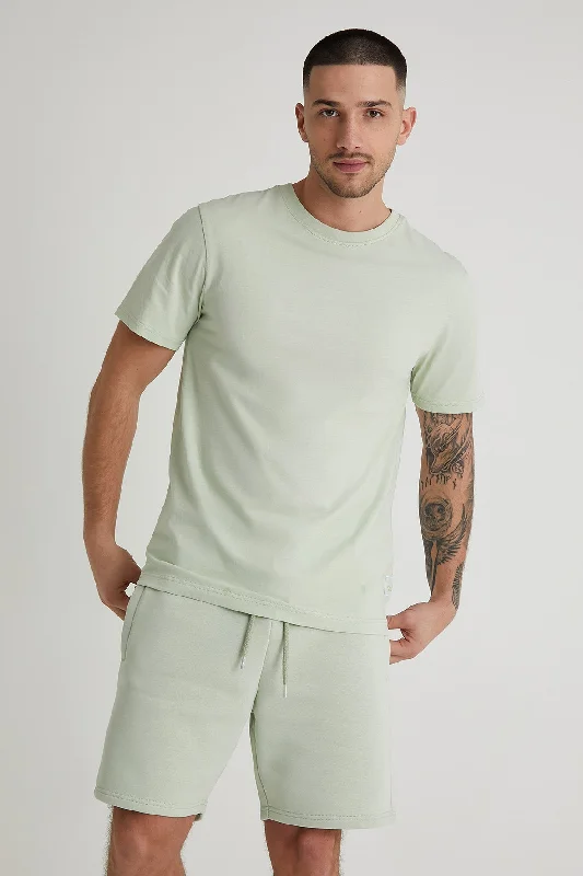 Men's Jeans with an Elastic Waistband for Ultimate ComfortAston crew neck t-shirt in Artichoke