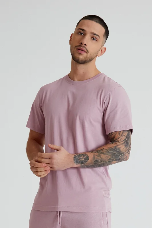 Men's High - Waisted Jeans in a Medium Wash for a Vintage - Style RevivalAston crew neck t-shirt in Mauve haze Men's High - Waisted Jeans in a Medium Wash for a Vintage - Style RevivalAston crew neck t-shirt in Mauve haze