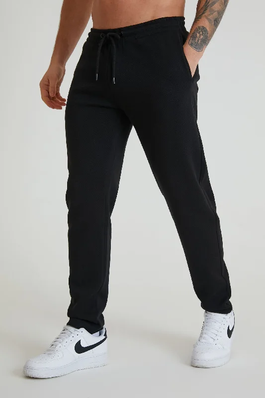 Men's Straight Leg Raw Denim Jeans for a Minimalist and Durable OptionAtlas premium pique drawstring trouser in Black Men's Straight Leg Raw Denim Jeans for a Minimalist and Durable OptionAtlas premium pique drawstring trouser in Black