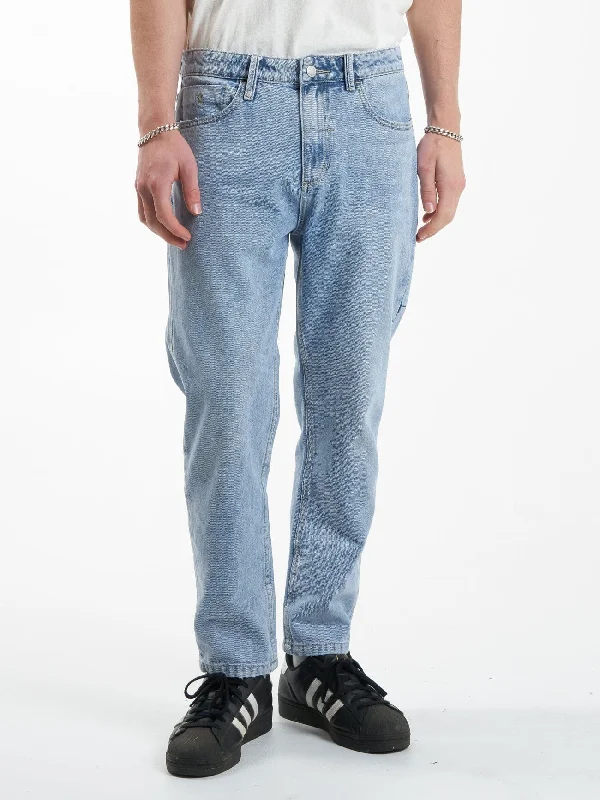 Men's Distressed Jeans with Patches for a Retro and DIY - Inspired AppearanceChopped Denim Jean - Endless Blue Men's Distressed Jeans with Patches for a Retro and DIY - Inspired AppearanceChopped Denim Jean - Endless Blue
