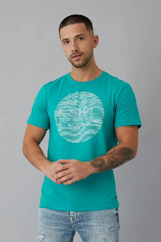Men's Distressed Jeans with Patches for a Retro and DIY - Inspired AppearanceMilo Printed crew neck t-shirt in Jade Men's Distressed Jeans with Patches for a Retro and DIY - Inspired AppearanceMilo Printed crew neck t-shirt in Jade