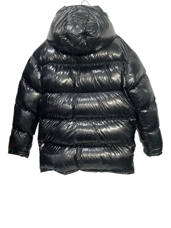 Hooded men jackets with a detachable faux - fur trim for added warmthMARC BY MARC JACOBS/Puffer Jkt/S/Nylon/BLK/Oversized Black Vinyl Black Hooded men jackets with a detachable faux - fur trim for added warmthMARC BY MARC JACOBS/Puffer Jkt/S/Nylon/BLK/Oversized Black Vinyl Black