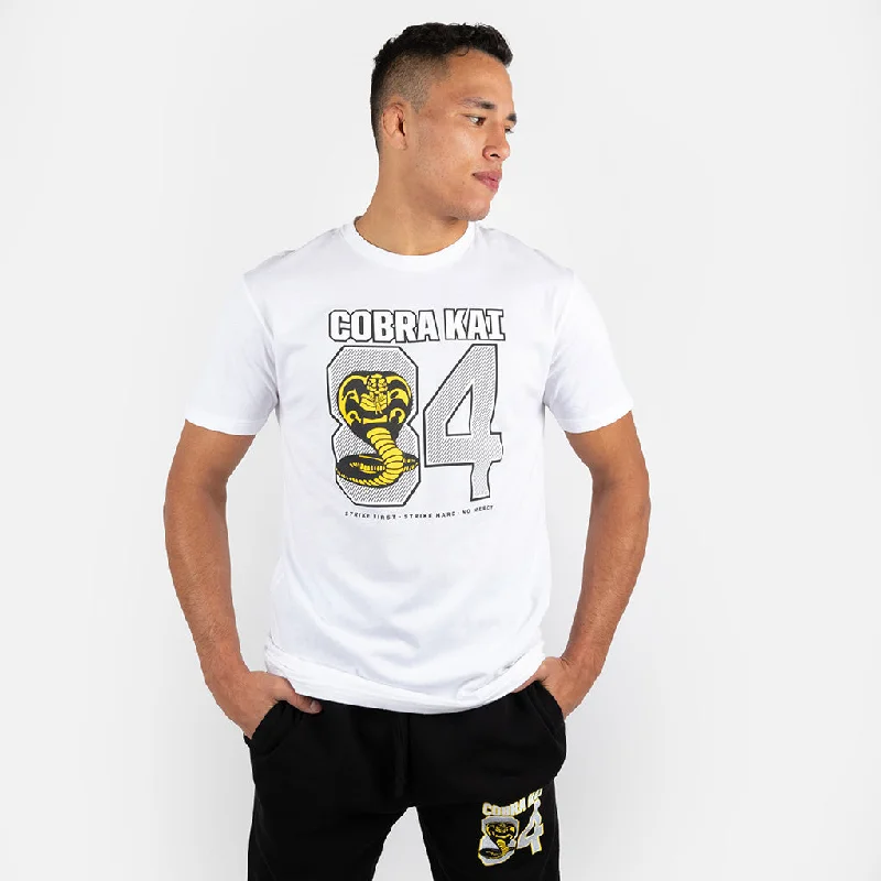 Men's mock - neck t - shirts with a modern and sleek styleCOBRA KAI '84 SHORT SLEEVE SHIRT Men's mock - neck t - shirts with a modern and sleek styleCOBRA KAI '84 SHORT SLEEVE SHIRT