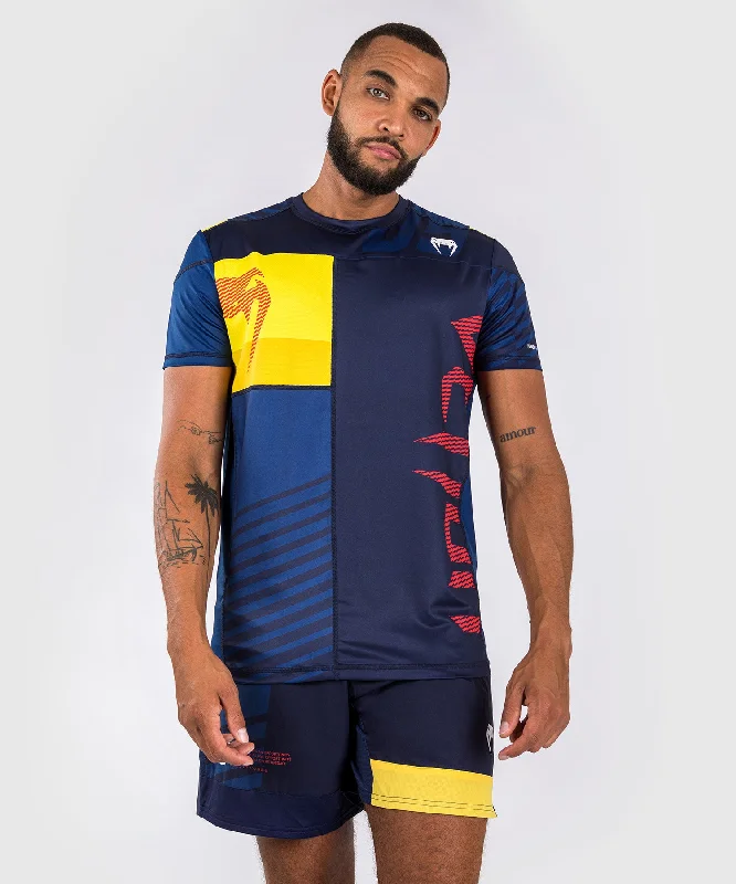 Men's polo t - shirts with a contrast collar for a preppy lookVenum Sport 05 Dry Tech T-shirt - Blue/Yellow Men's polo t - shirts with a contrast collar for a preppy lookVenum Sport 05 Dry Tech T-shirt - Blue/Yellow